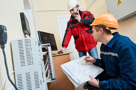 Technicians Installing